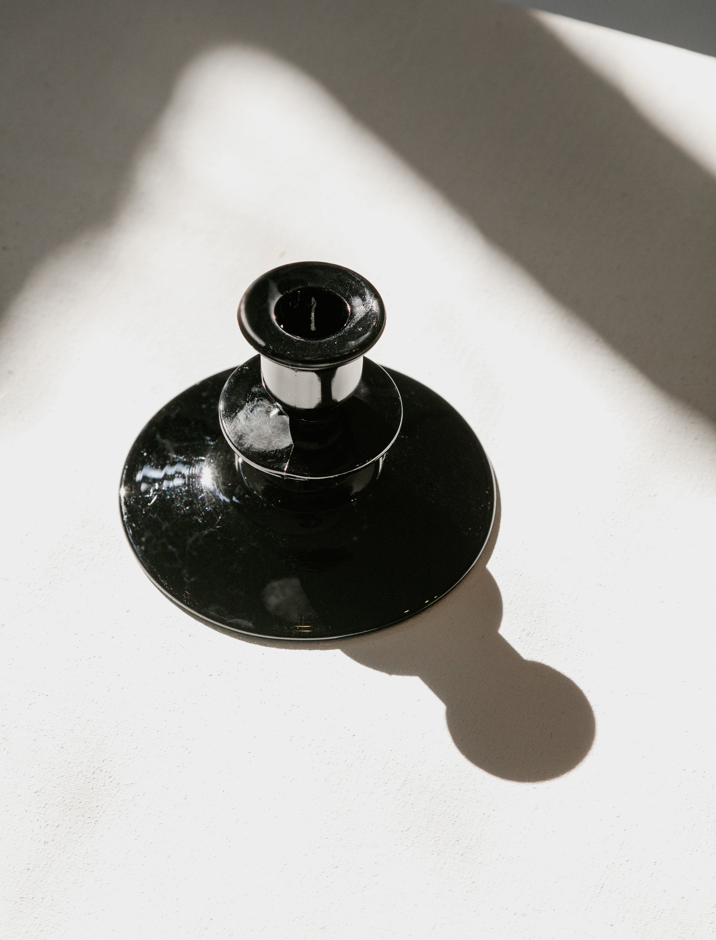 Found Deep Black Glass Candlestick