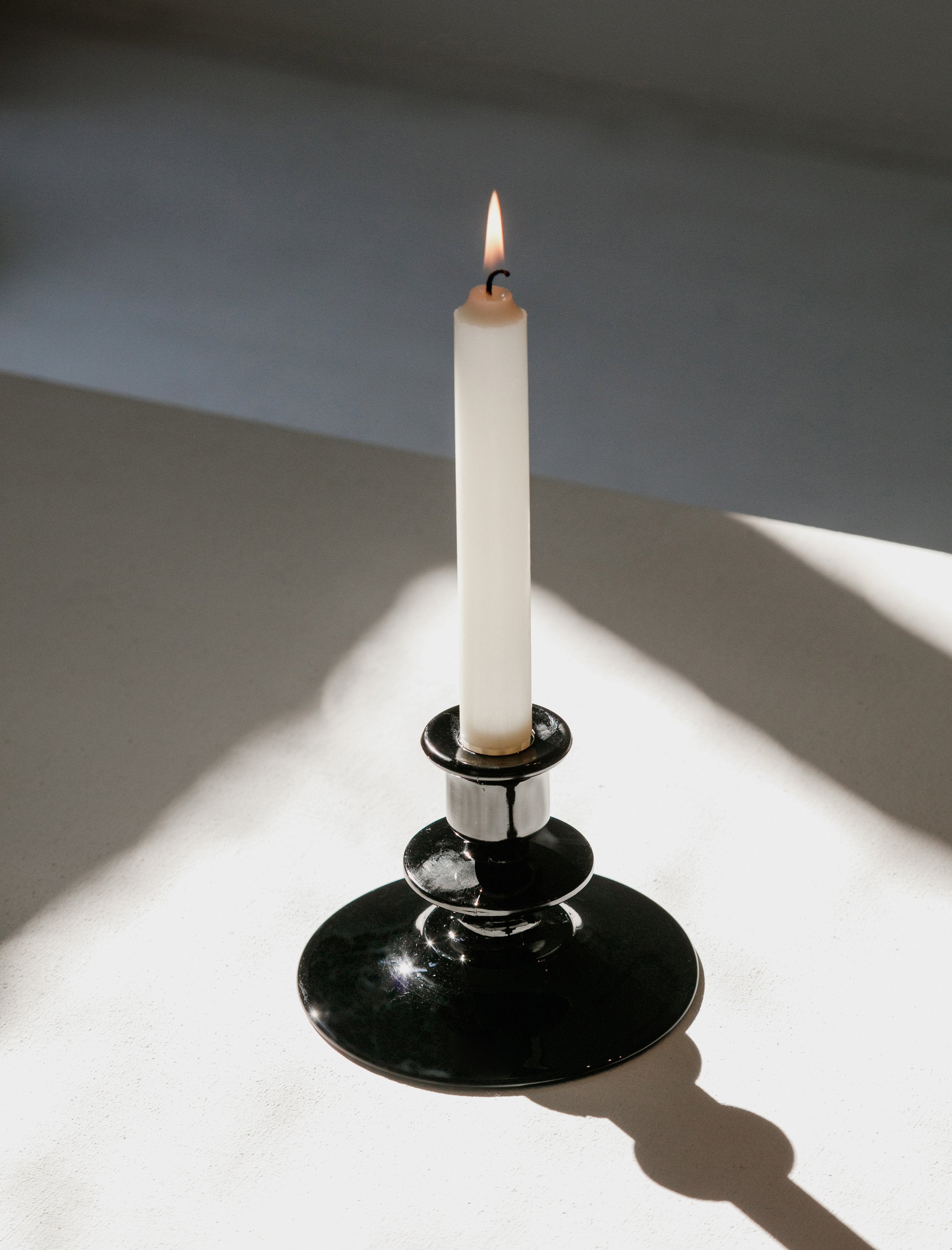 Found Deep Black Glass Candlestick